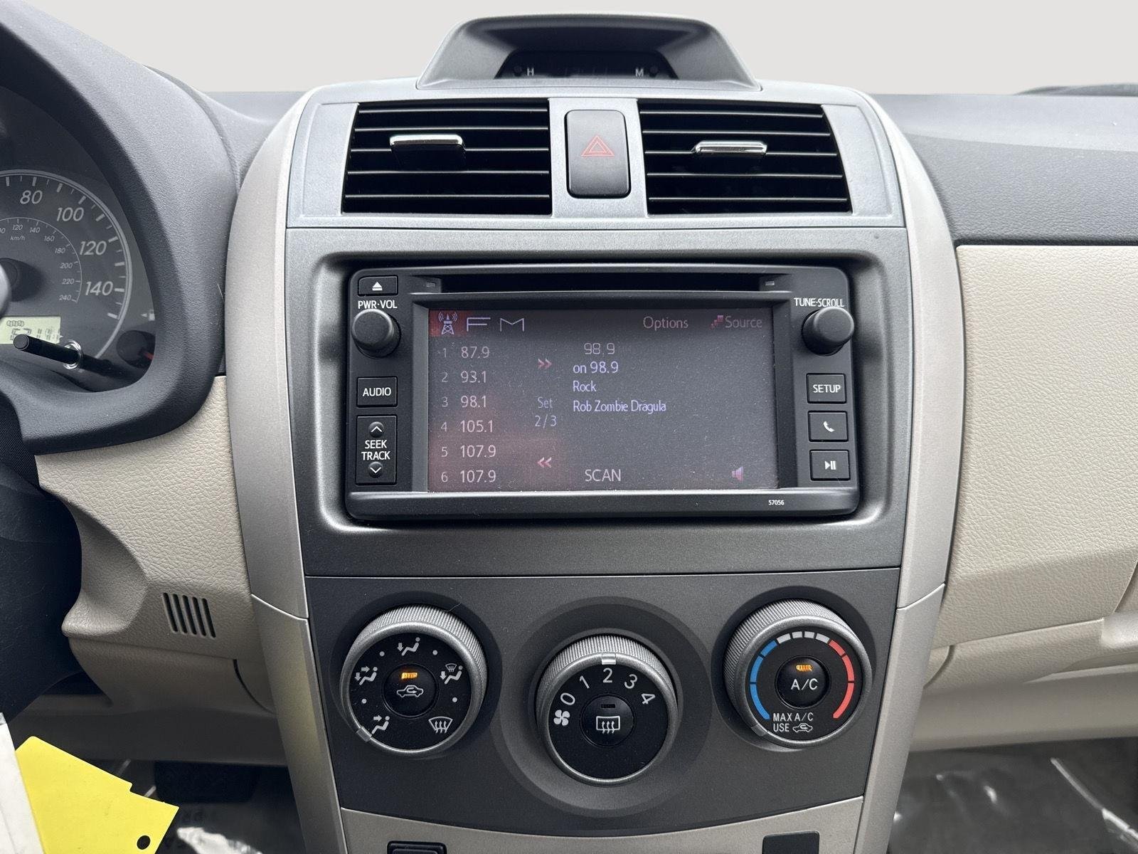 Used 2013 Super White Toyota LE image 4