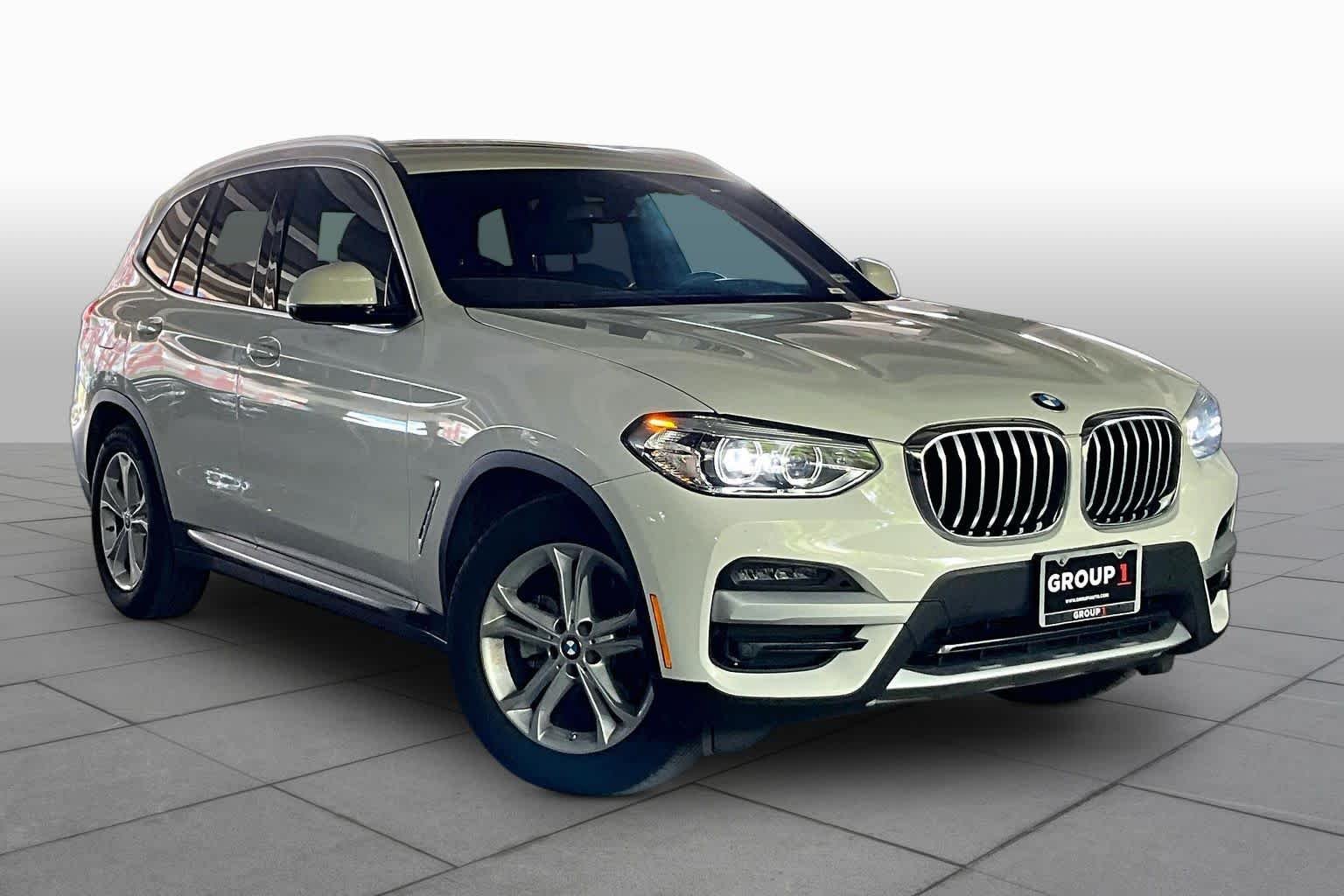 Used 2021 Alpine White BMW sDrive30i image 2