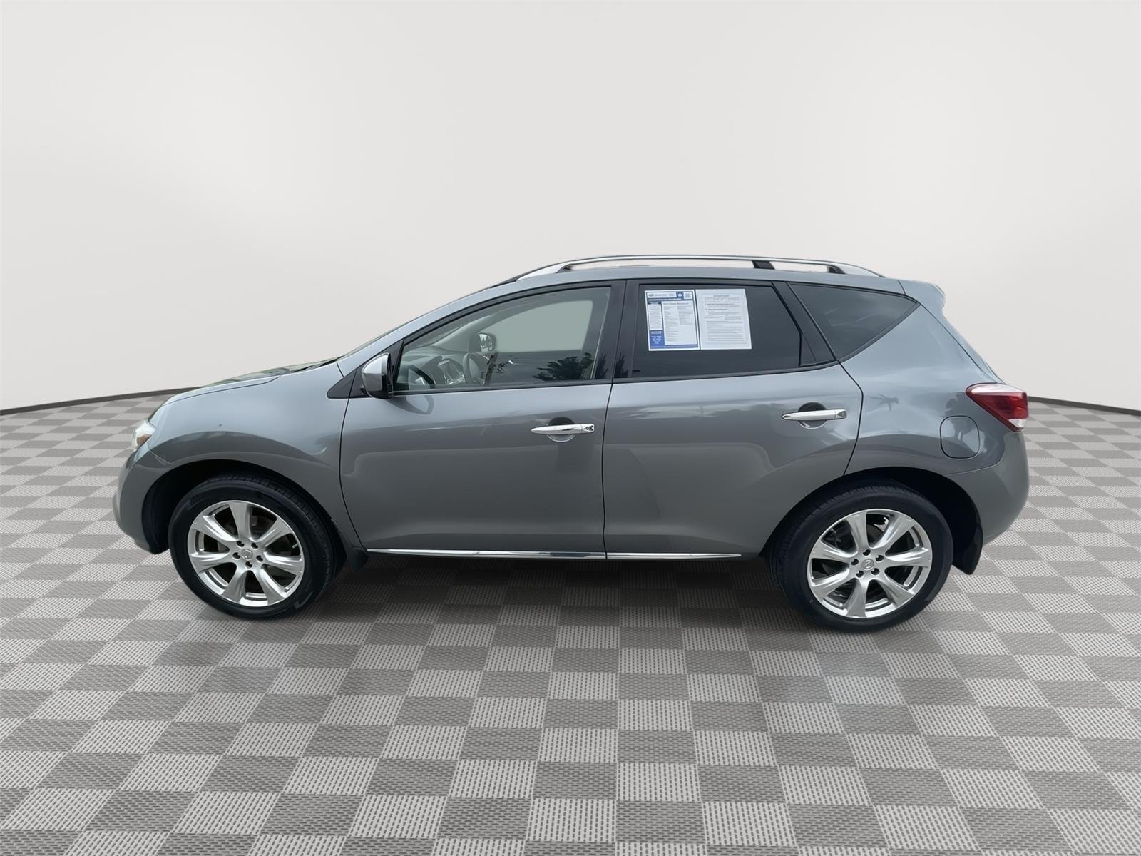 Used 2013 Gun Metallic Nissan LE image 12