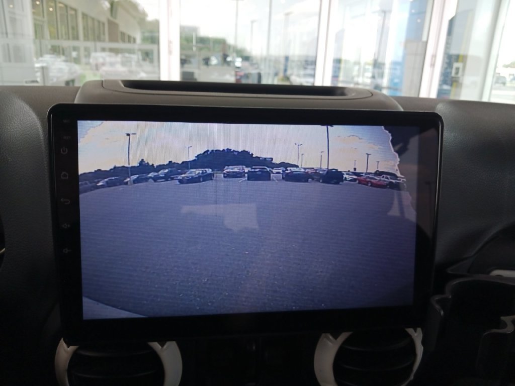 Used 2016 White Jeep Unlimited Sahara image 22