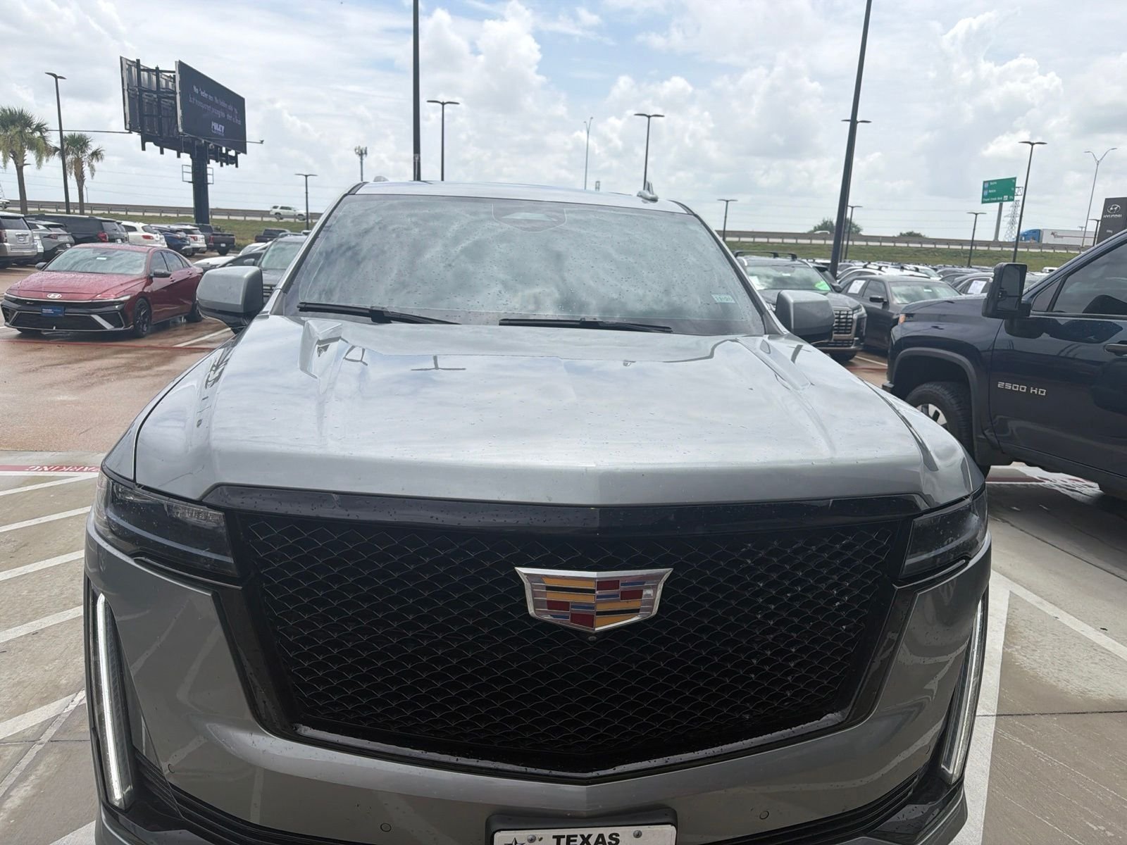 Used 2023 Argent Silver Metallic Cadillac Sport image 2