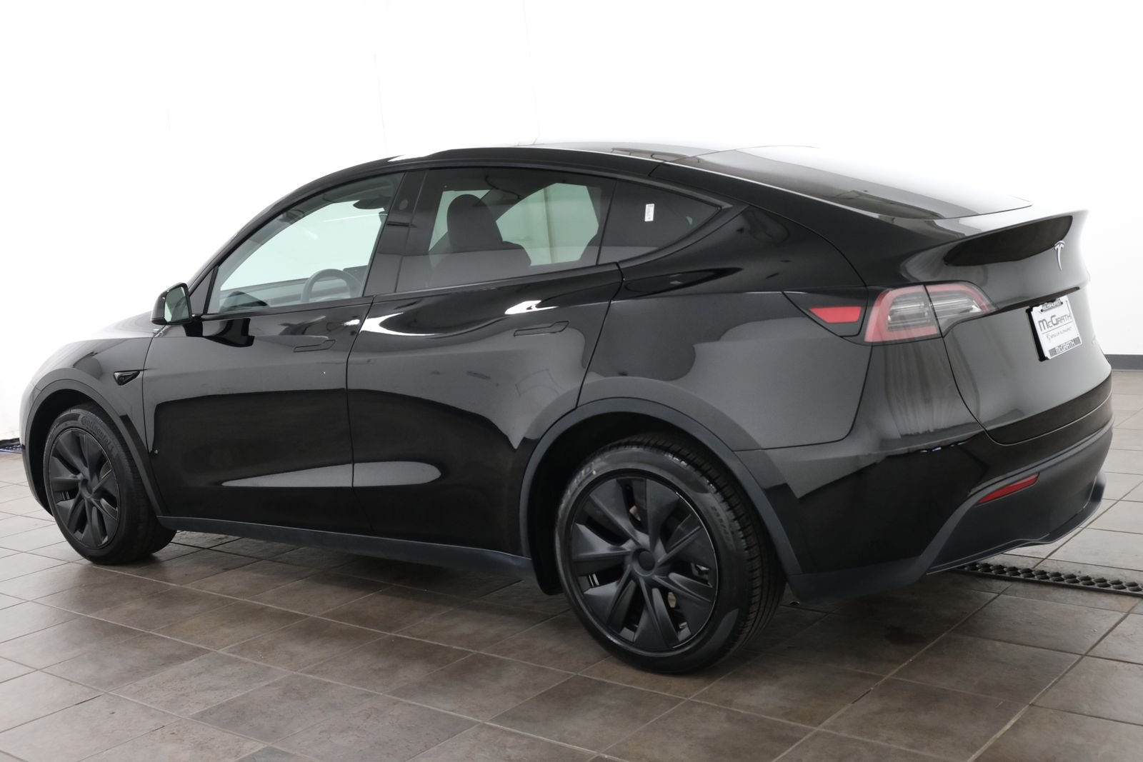 Used 2024 Solid Black Tesla Long Range image 5