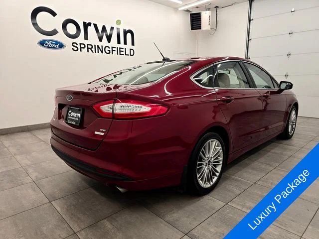 Used 2013 Ruby Red Metallic Ford SE image 6