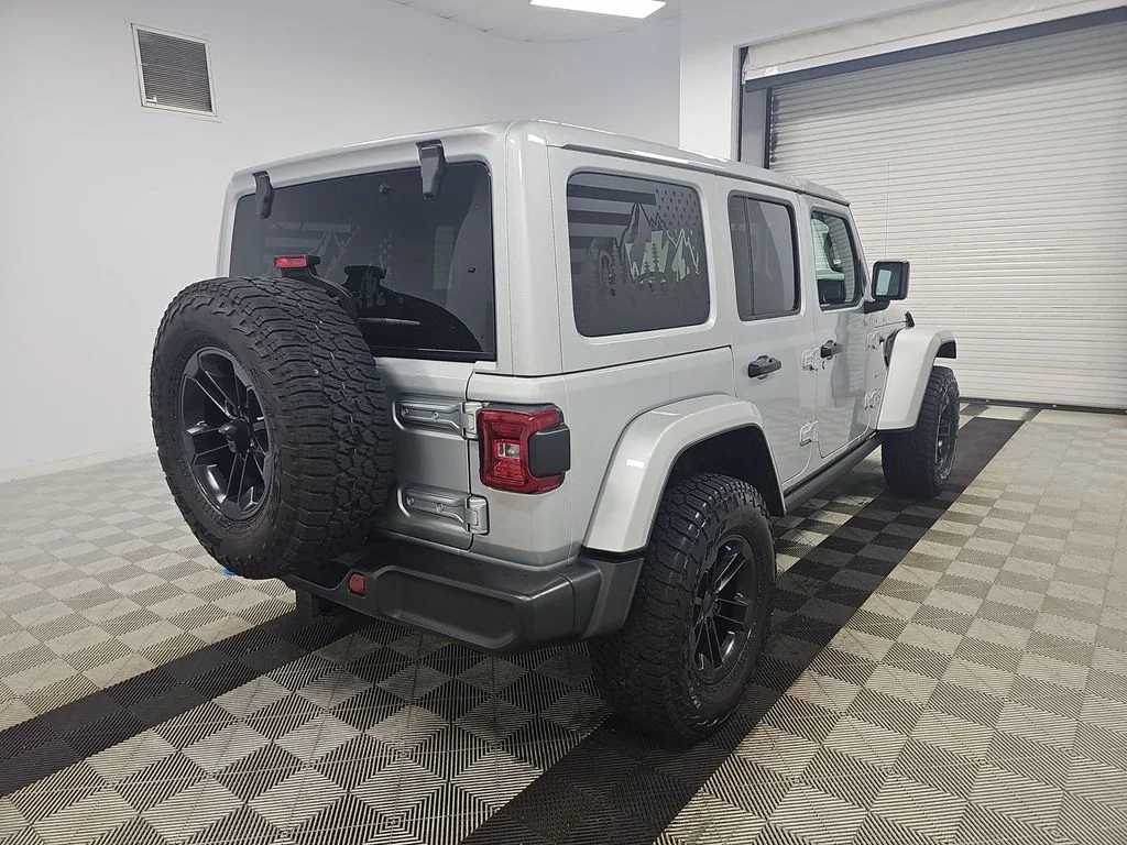 Used 2023 Silver Jeep Sahara 4xe image 2