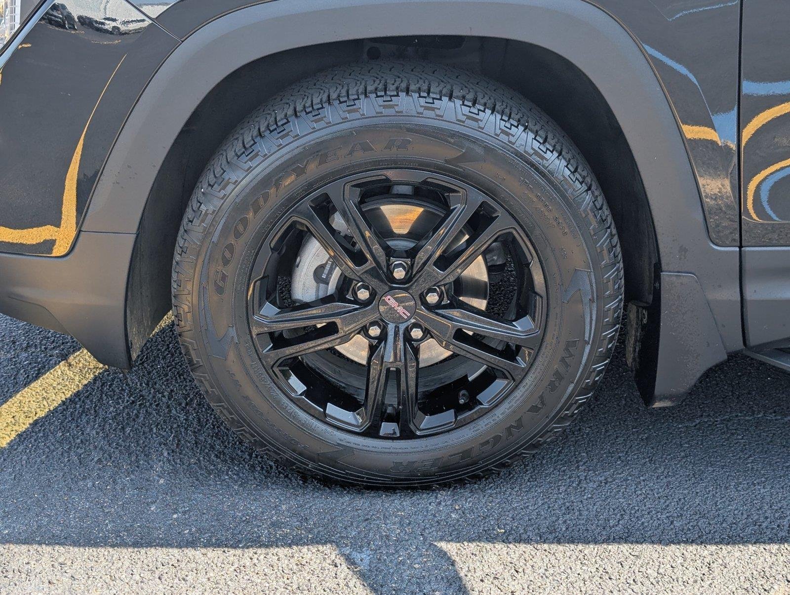 Used 2023 EBONY TWILIGHT METALLIC GMC AT4 image 9