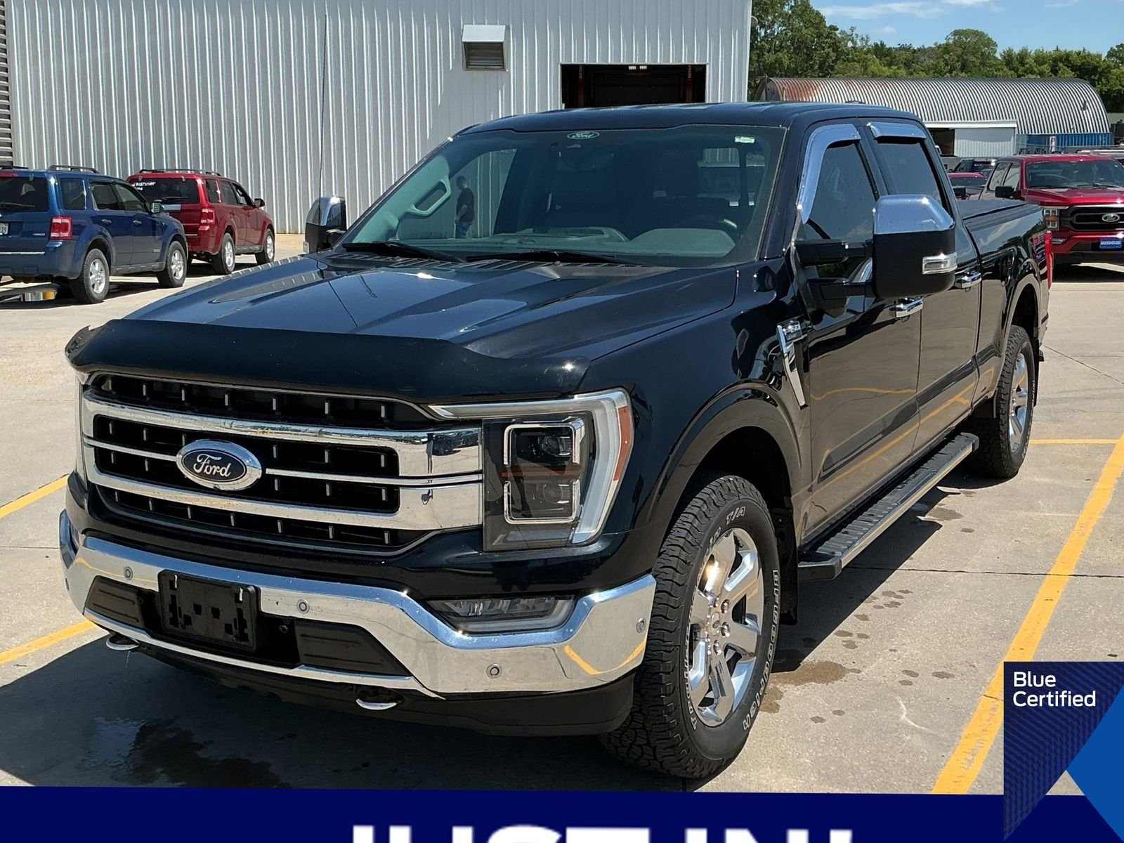 Certified Used 2021 Black Ford Lariat image 1