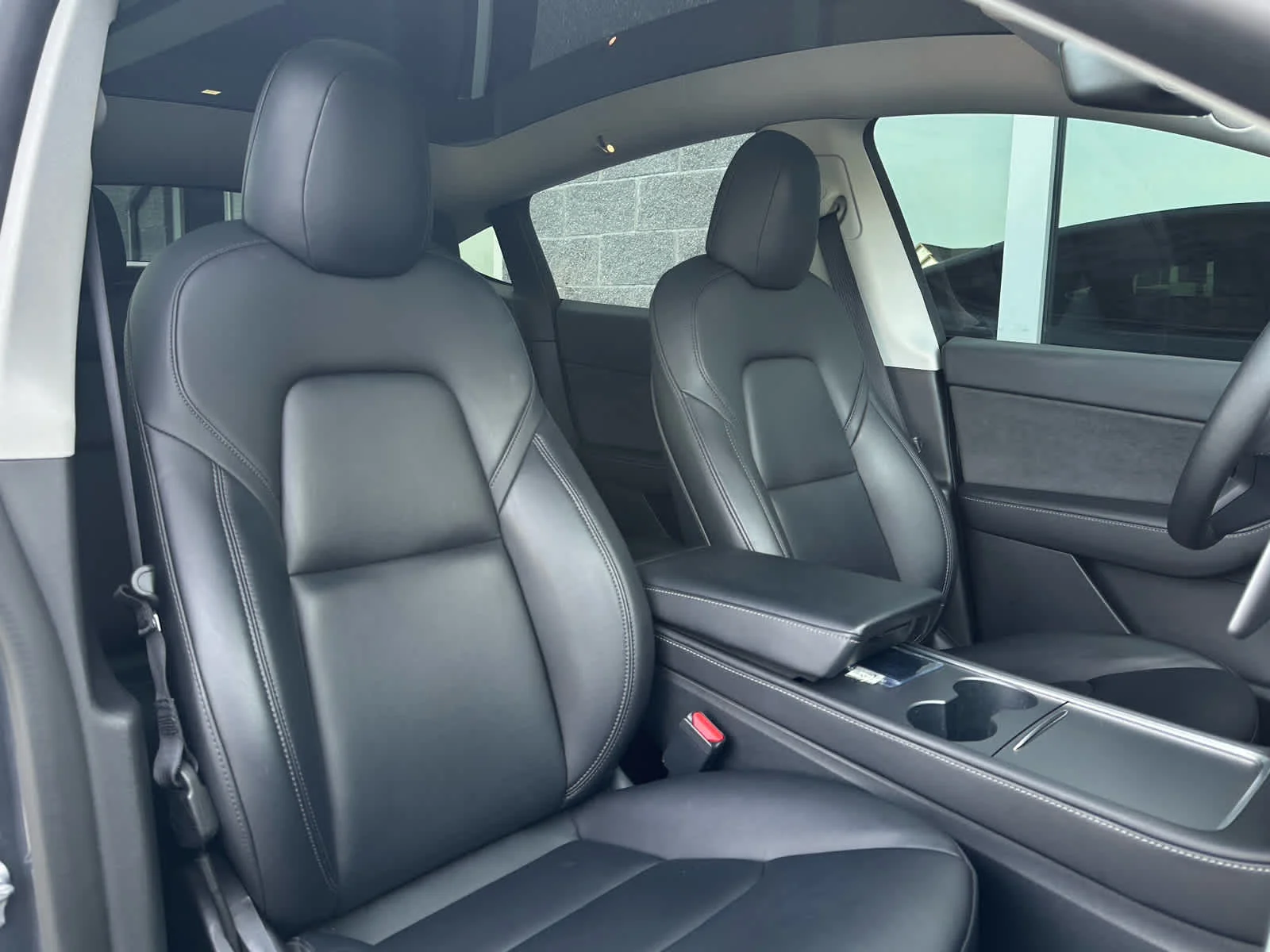 Used 2022 Solid Black Tesla Performance image 11