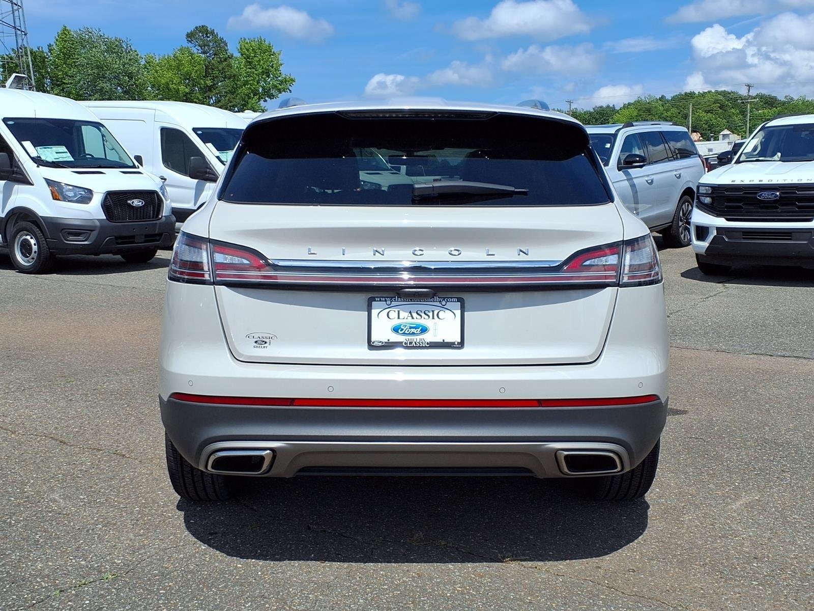 Used 2023 Ceramic Pearl Metallic Tinted Clearcoat Lincoln Reserve image 9