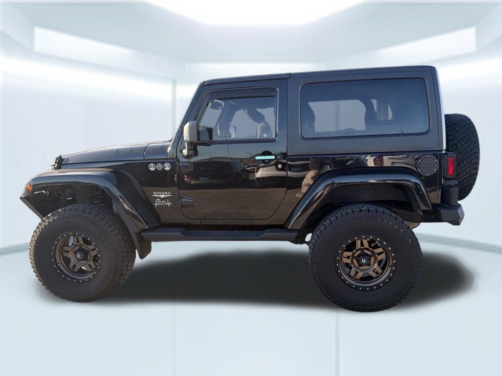 Used 2015 Black Clearcoat Jeep Sahara image 19