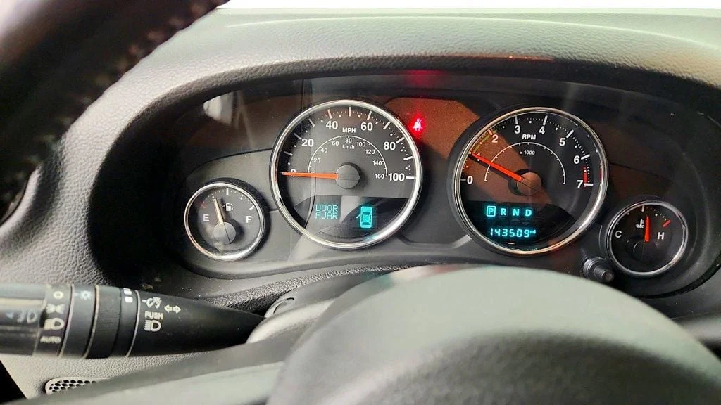 Used 2017 Granite Crystal Metallic Clearcoat Jeep Sahara 4x4 w/ Heated Seats, Remote Start & Connectivity Pkg image 16