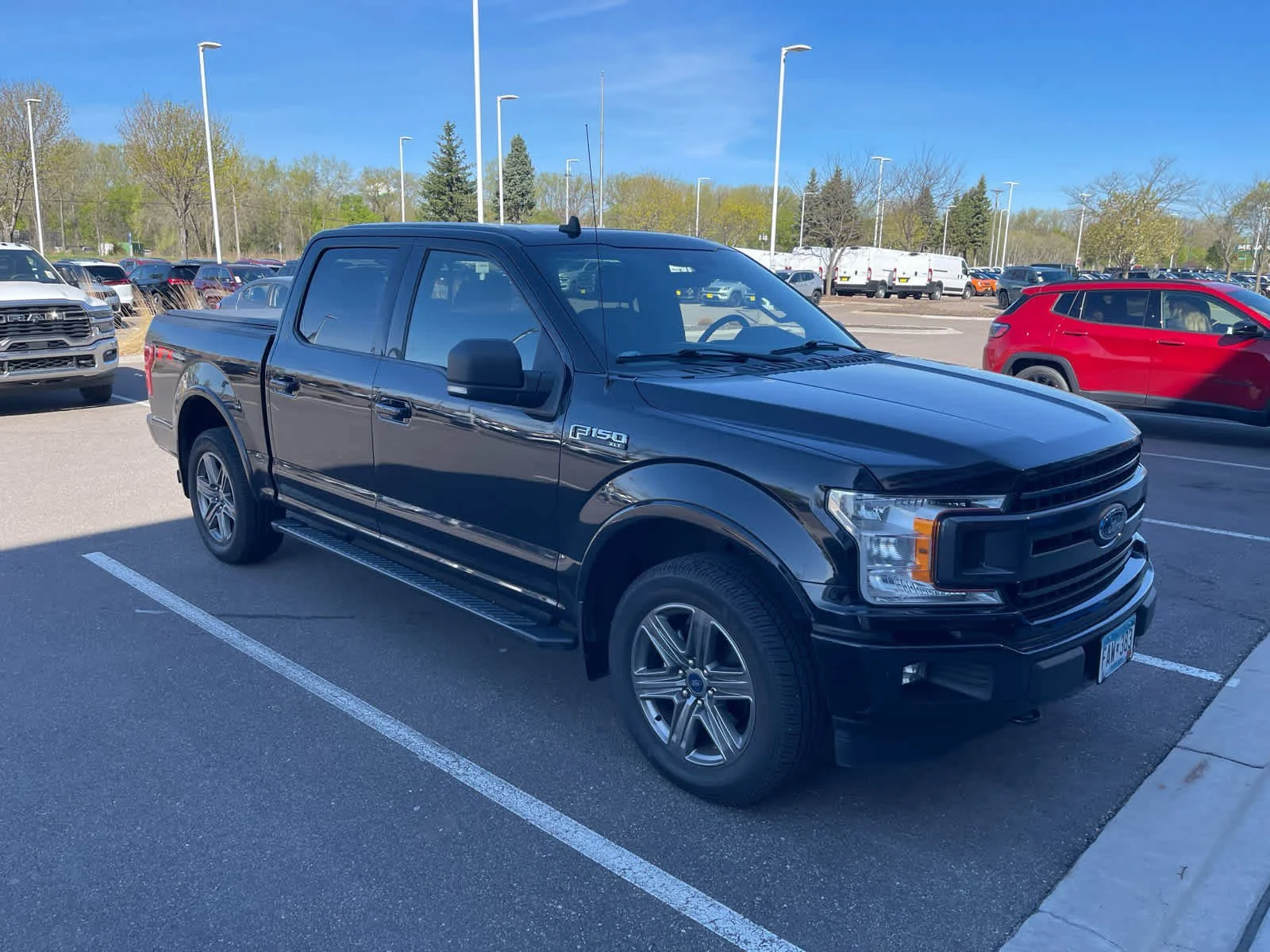 Used 2020 Ford F-150 XLT with VIN 1FTEW1EP2LKE73259 for sale in Brooklyn Park, Minnesota