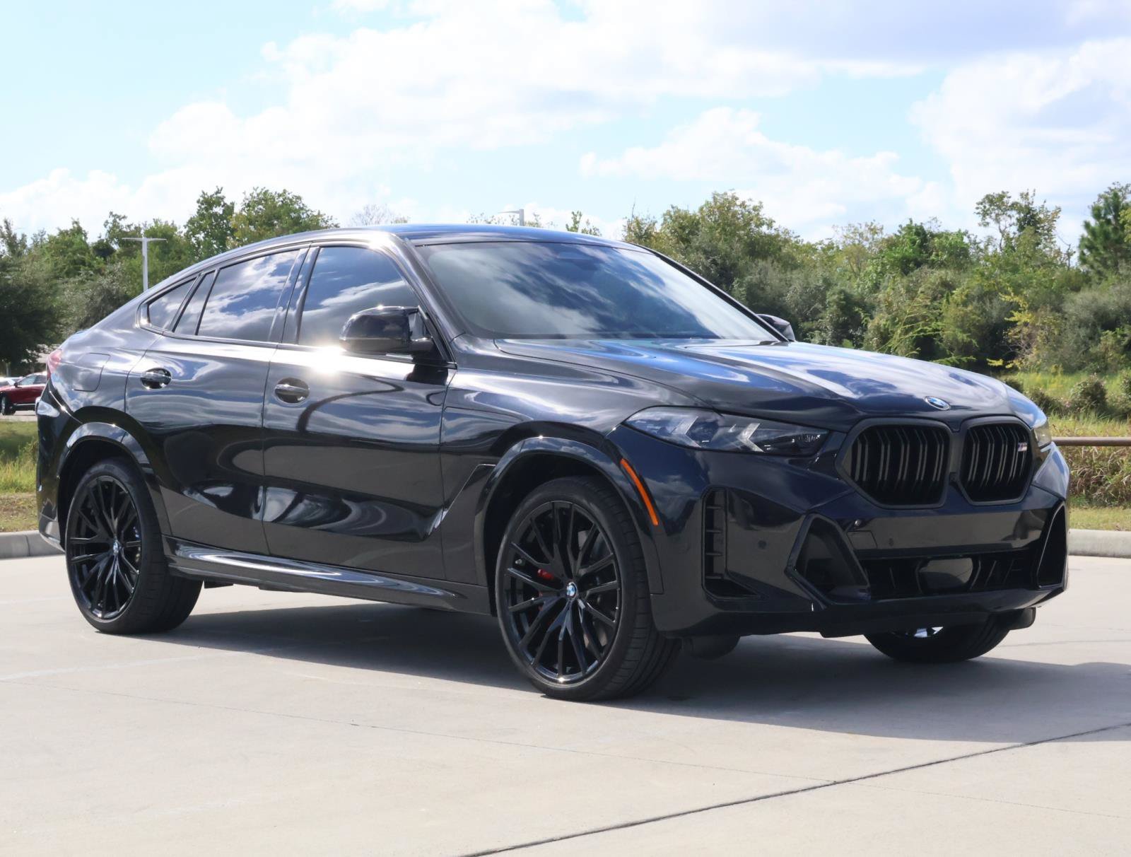 Used 2025 Black Sapphire Metallic BMW M60i image 6