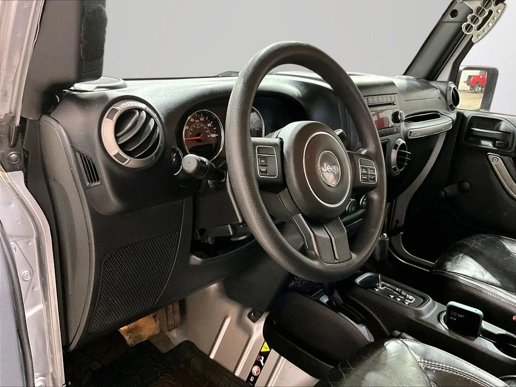 Used 2015 Silver Jeep Unlimited Sport image 13