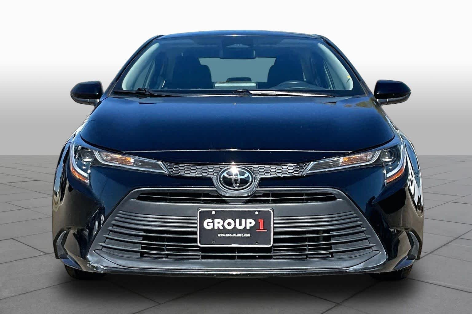 Used 2025 Midnight Black Metallic Toyota LE image 4