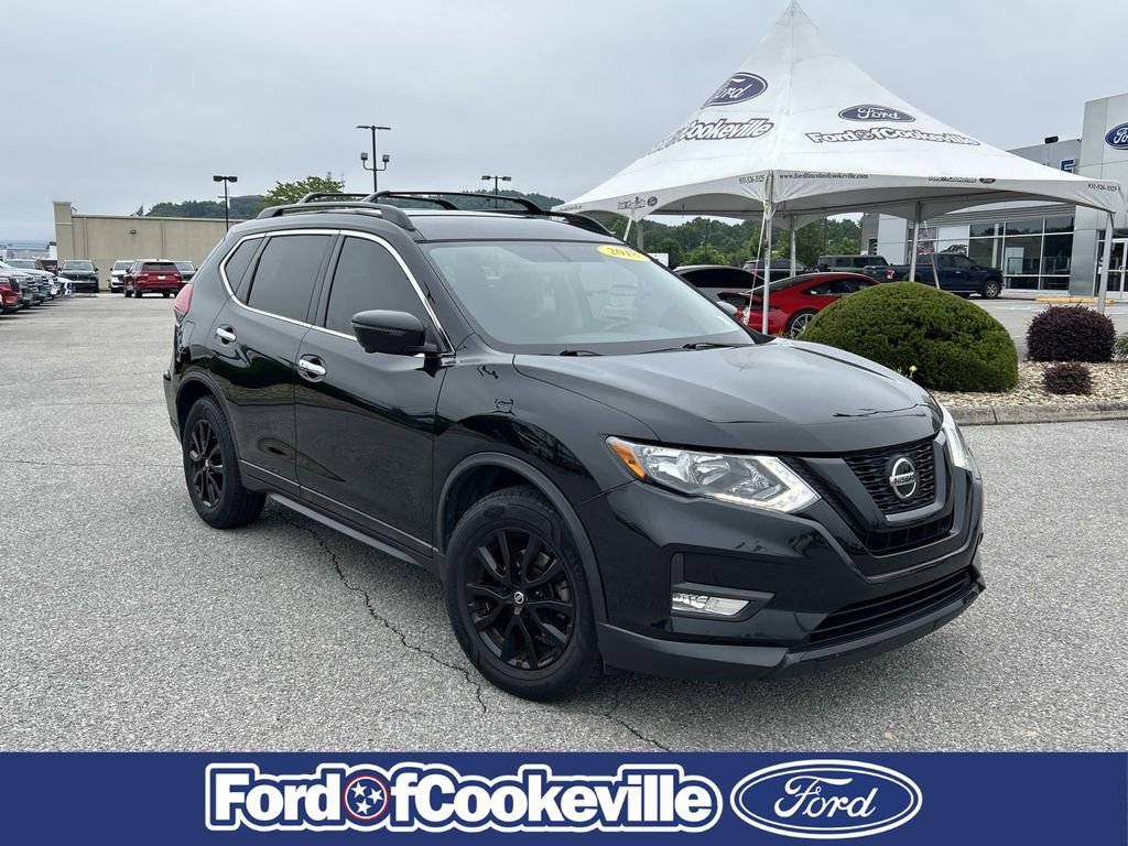 Used 2018 Magnetic Black Nissan SV image 1