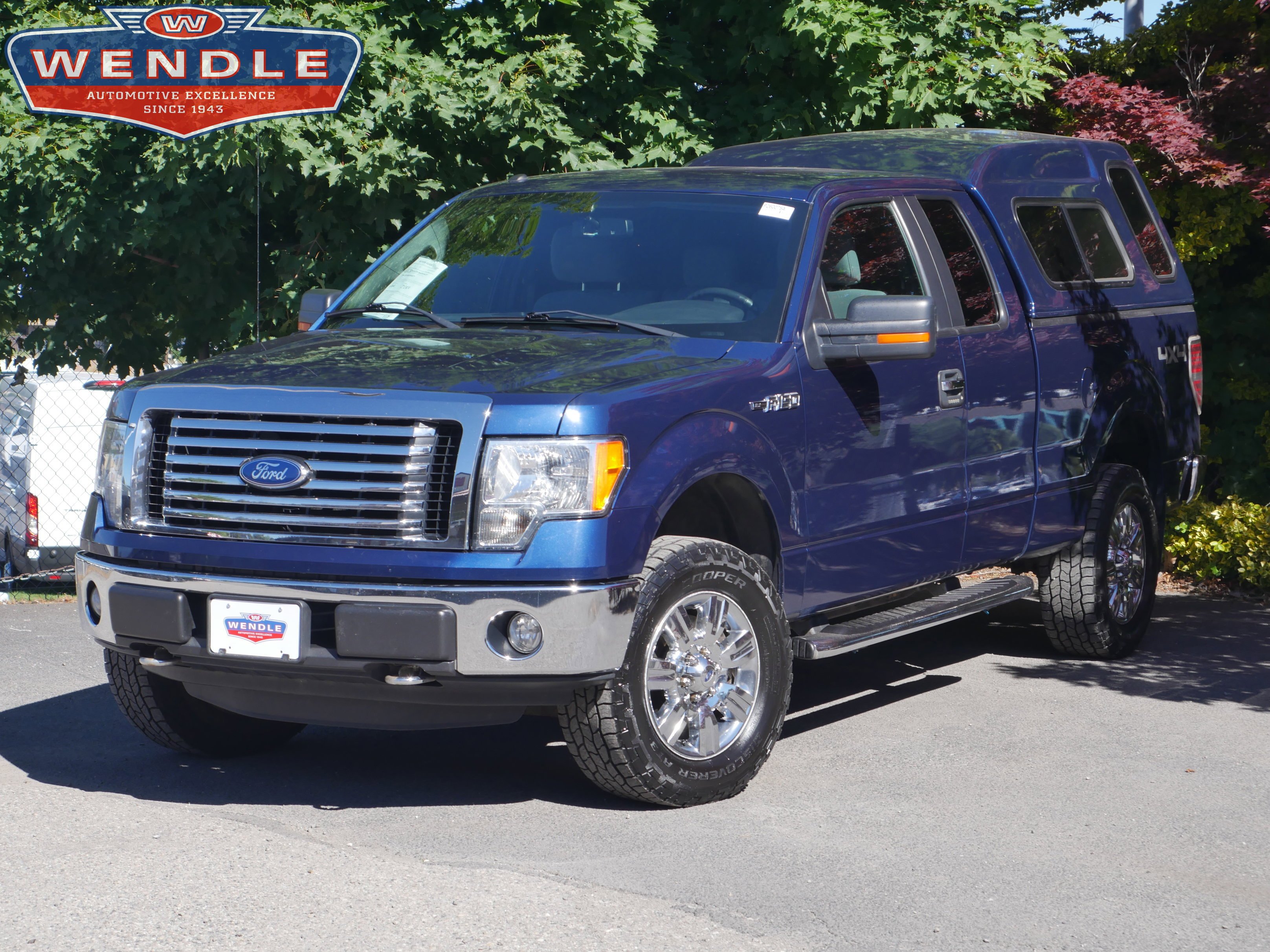 Used 2011 Dark Blue Pearl Metallic Ford XLT image 1