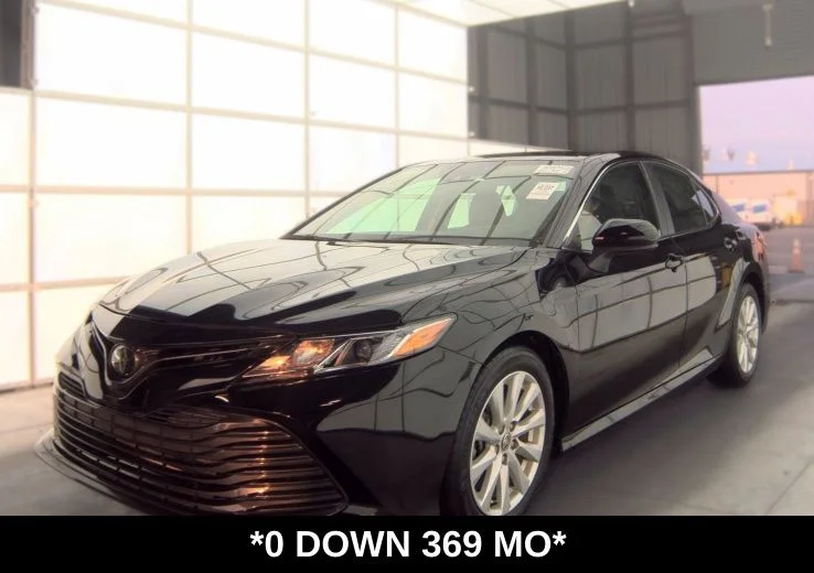 Used 2020 Midnight Black Metallic Toyota LE image 1