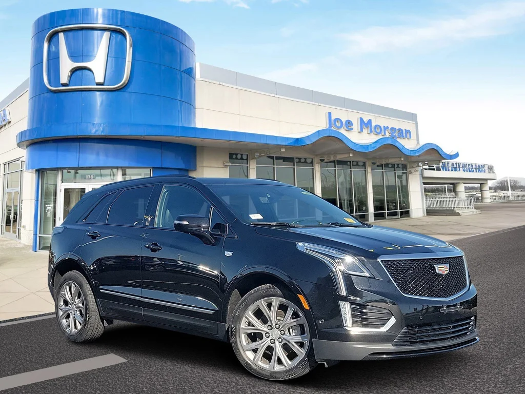 Used 2020 Stellar Black Metallic Cadillac Sport image 1