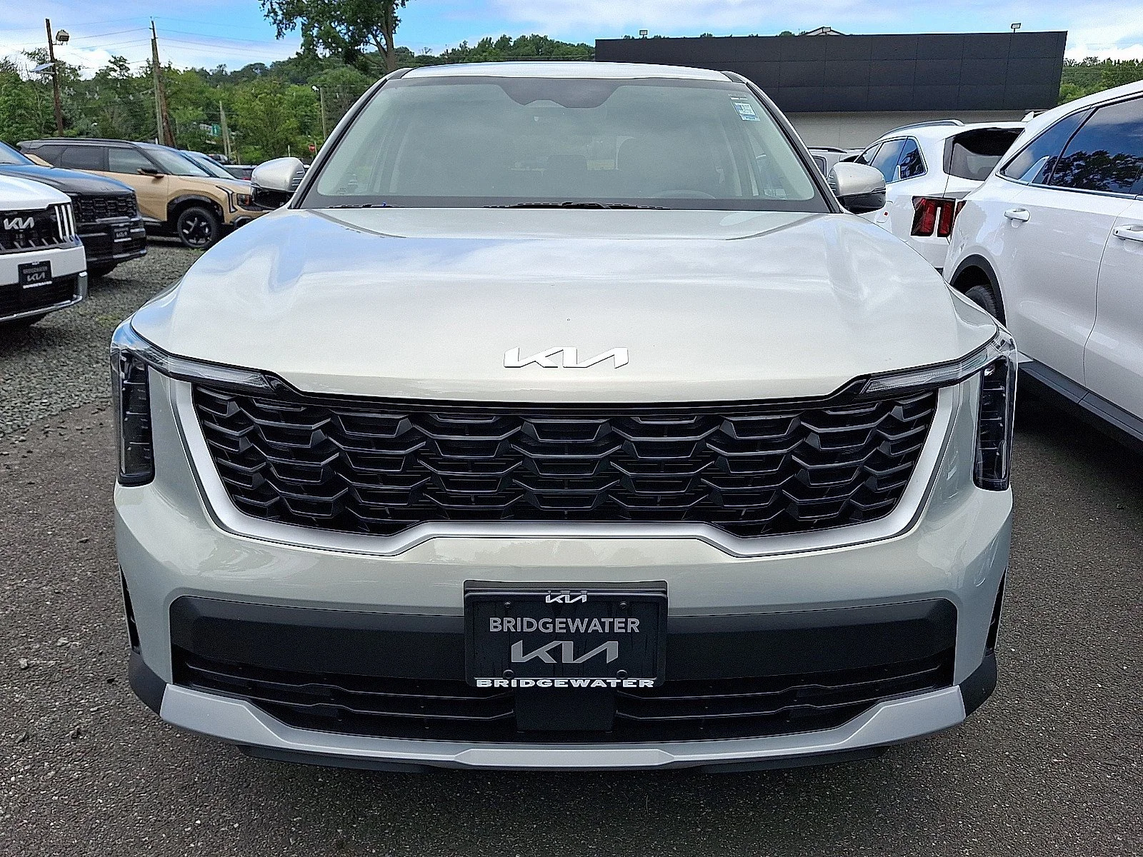 New 2026 Ivory Silver Kia LX image 2
