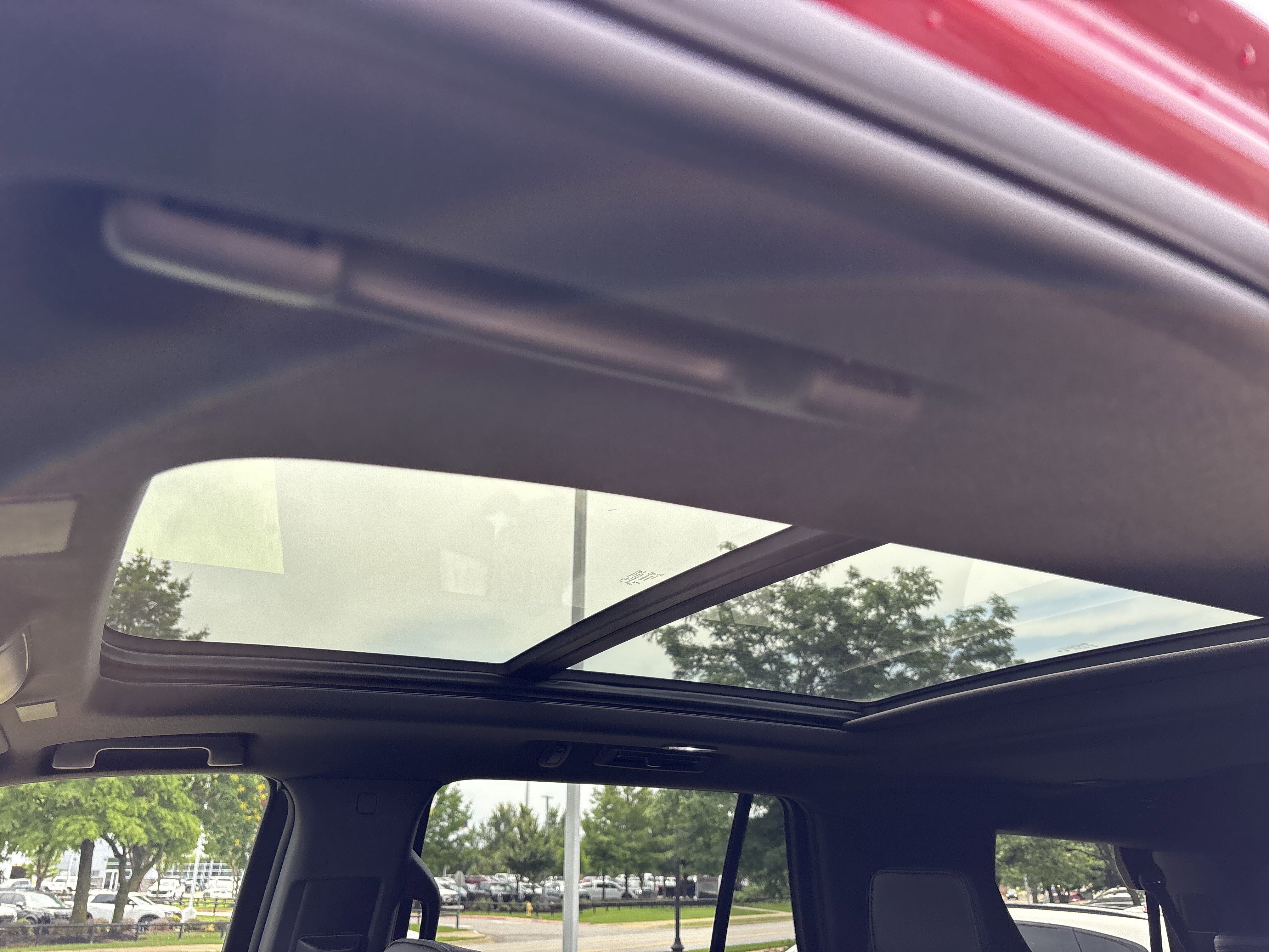 Used 2025 Volcanic Red Tintcoat GMC Denali 4WD image 21