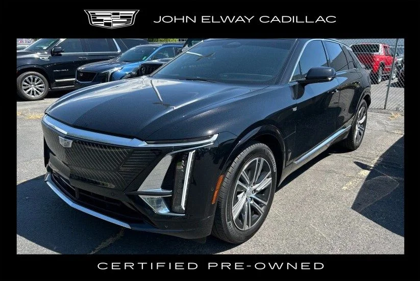Used 2024 Stellar Black Metallic Cadillac Luxury image 1