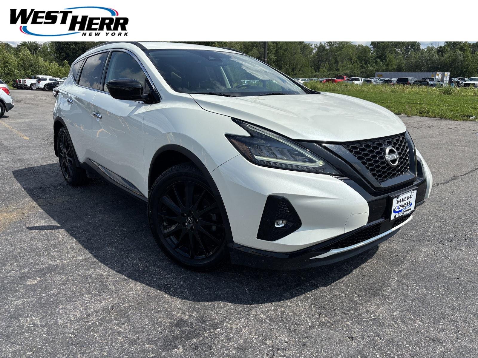 Used 2023 Pearl White Tricoat Nissan SV image 1