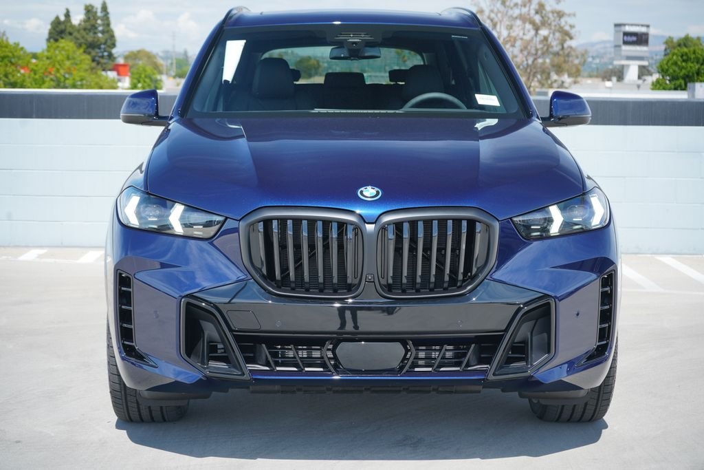 New 2026 Tanzanite Blue II Metallic BMW xDrive50e image 2
