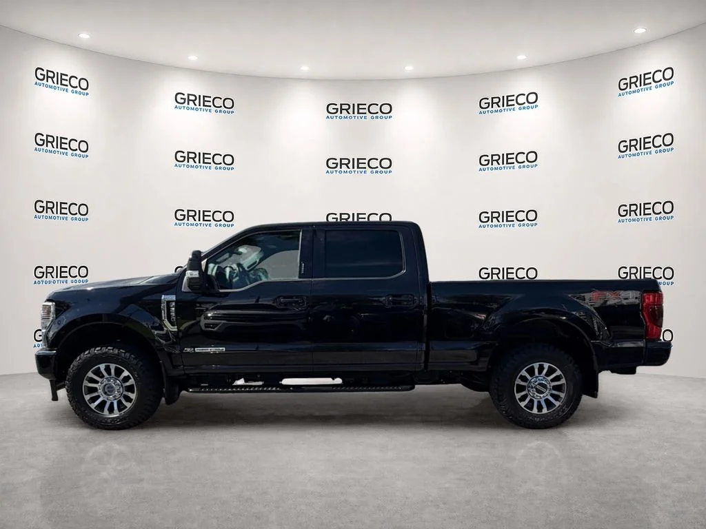 Used 2022 Agate Black Metallic Ford Lariat image 4