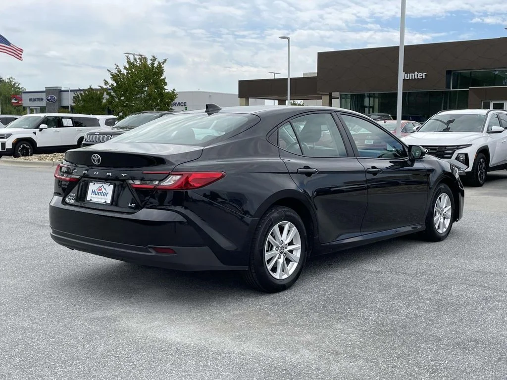 Used 2025 Midnight Black Metallic Toyota LE image 27