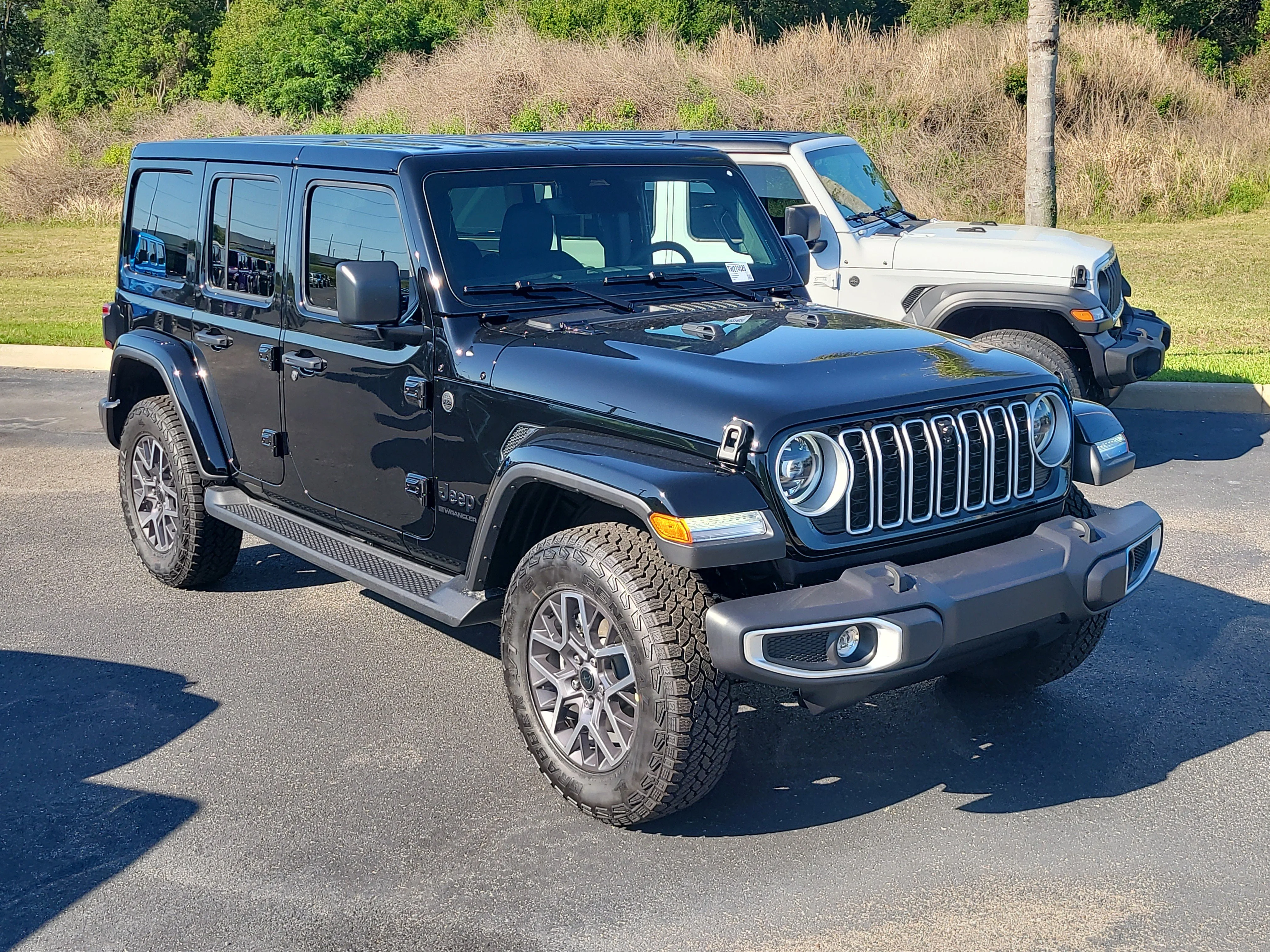 New 2026 Black Clearcoat Jeep Sahara image 1