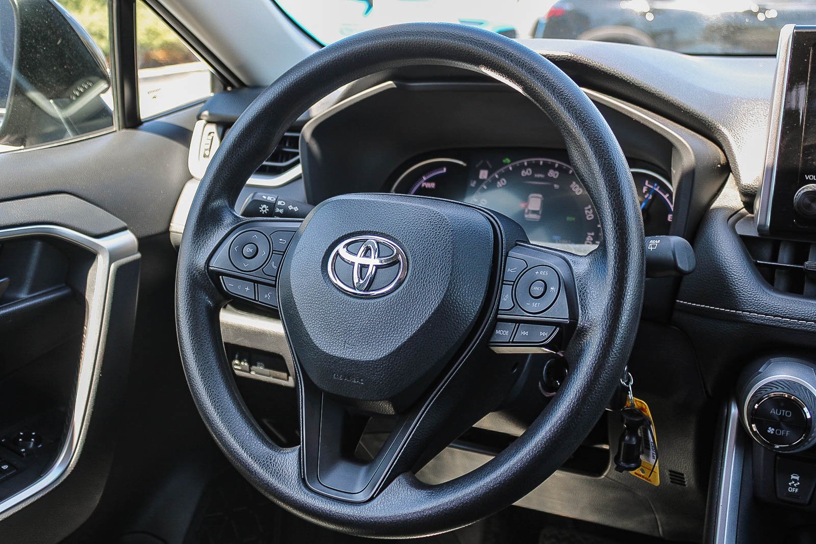 Used 2024 Midnight Black Metallic Toyota Hybrid LE image 16