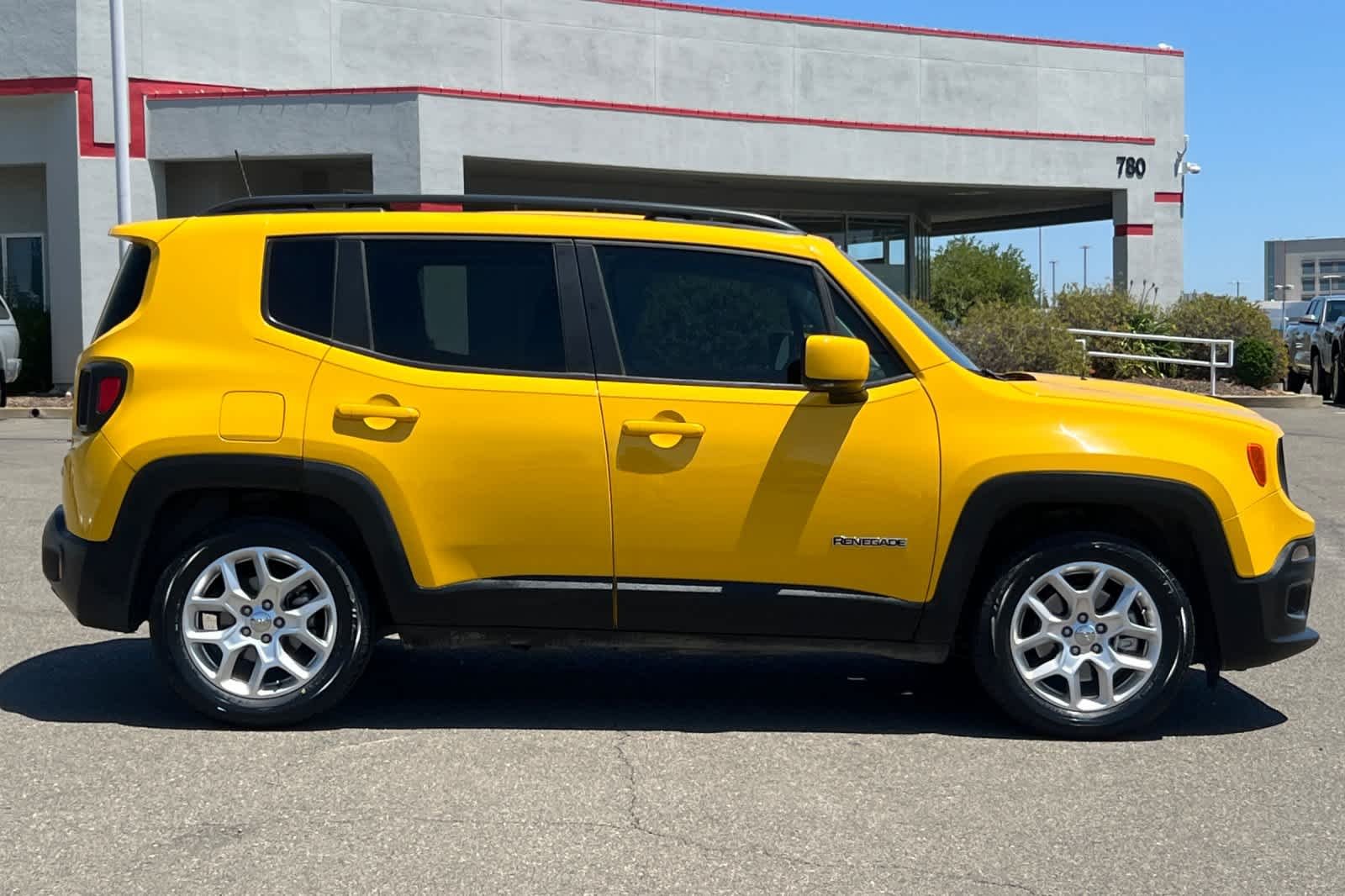 Used 2018 Solar Yellow Jeep Latitude image 6