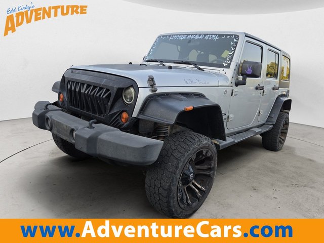 Pre-Owned 2012 Jeep Wrangler Unlimited Sport