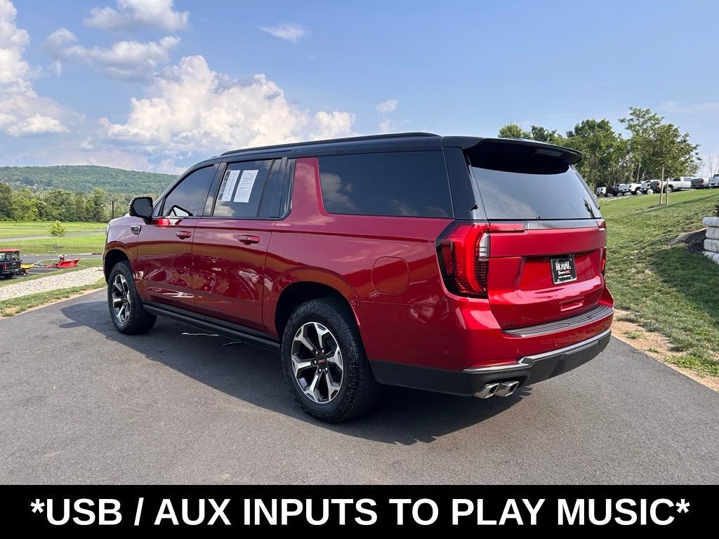 Used 2025 Volcanic Red Tintcoat GMC AT4 Ultimate image 9