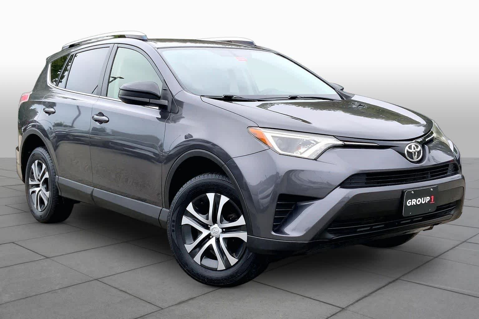 Used 2016 Magnetic Gray Metallic Toyota LE image 3