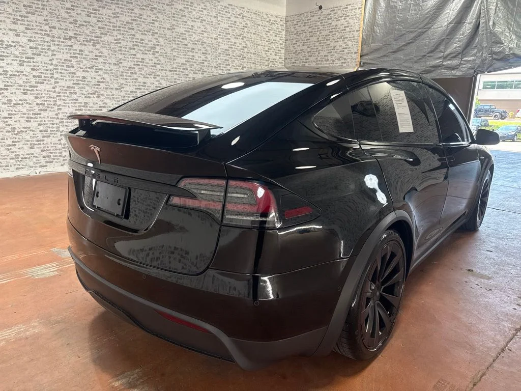 Used 2022 Solid Black Tesla Base image 7