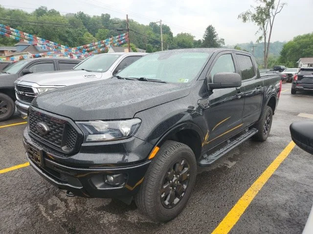 Used 2021 Shadow Black Ford XLT image 1