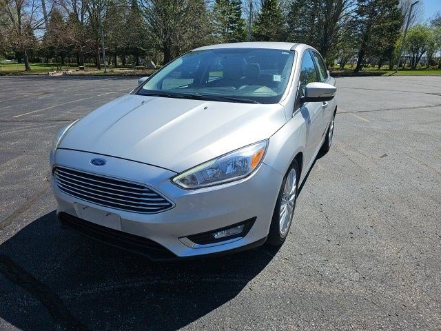 Used 2015 Ford Focus Titanium with VIN 1FADP3J20FL231086 for sale in Urbandale, IA