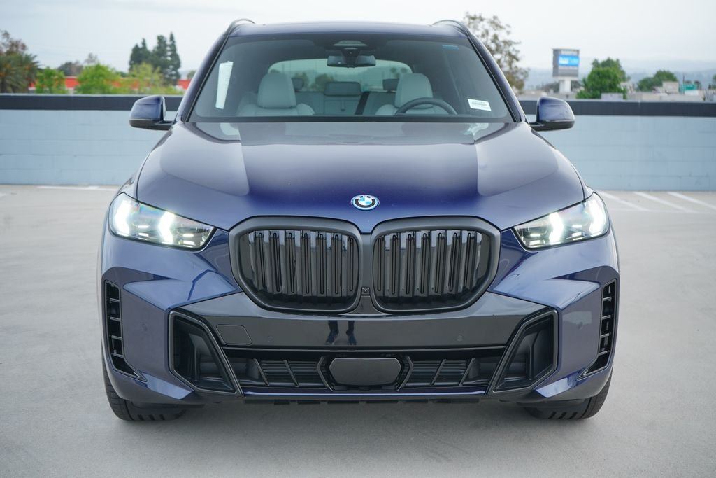 New 2026 Tanzanite Blue II Metallic BMW xDrive50e image 2