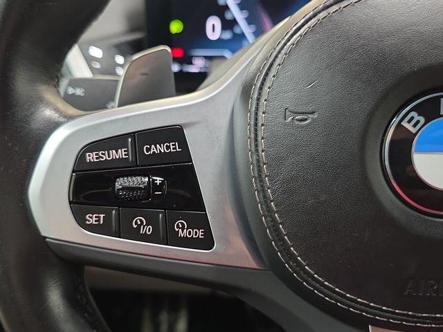 Certified Used 2024 Black Sapphire Metallic BMW xDrive40i image 13