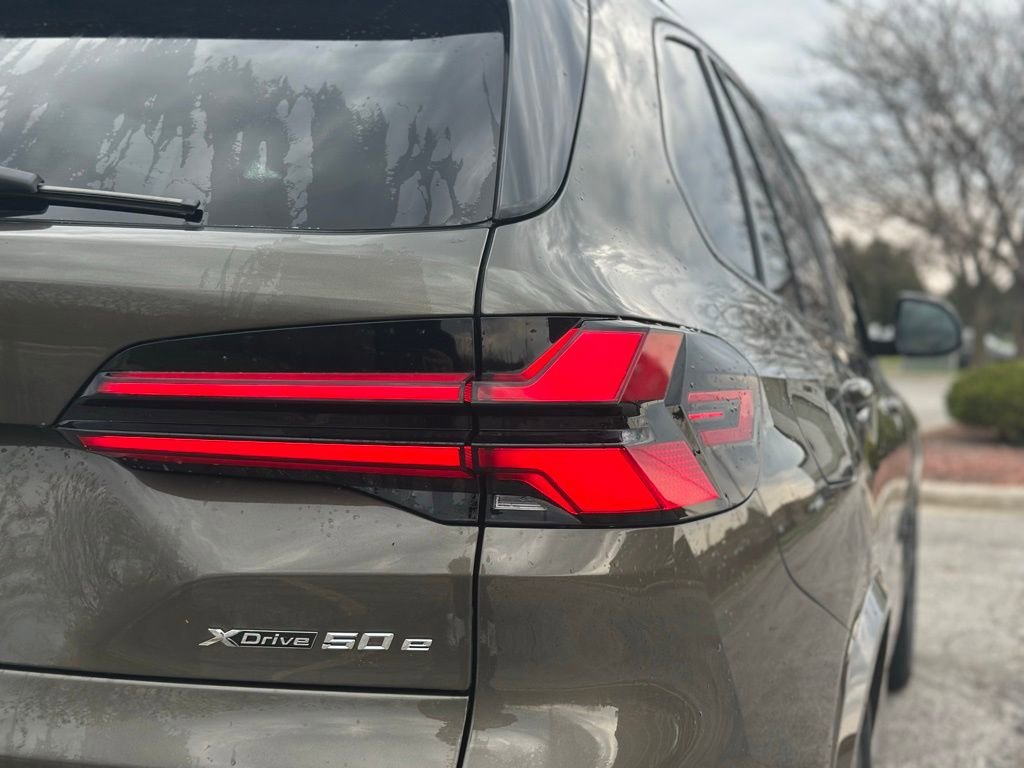 New 2026 Manhattan Green Metallic BMW xDrive50e image 12