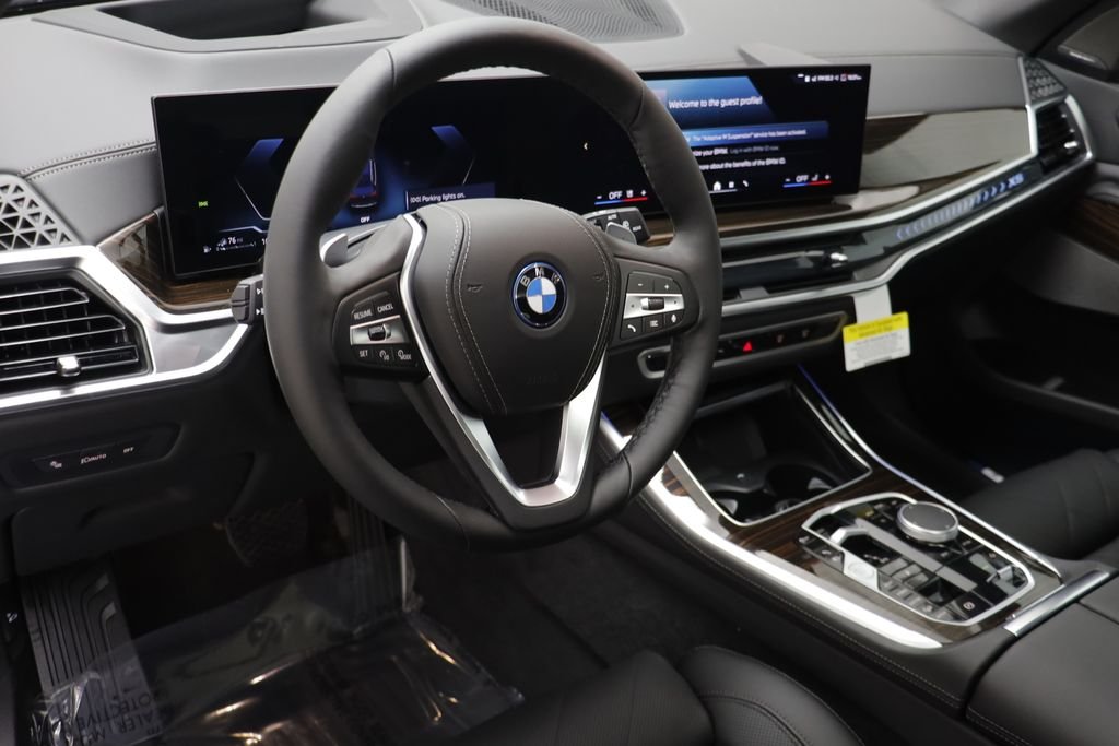 New 2026 Black Sapphire Metallic BMW xDrive50e image 8