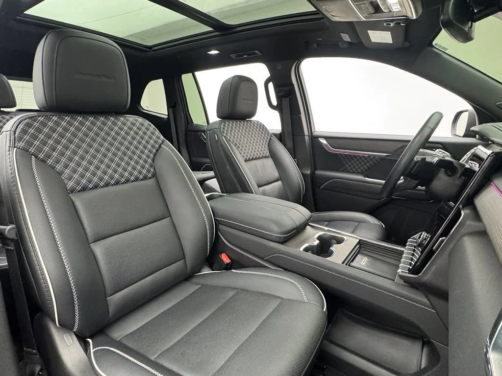 Used 2024 Ebony Twilight Metallic GMC Denali image 39