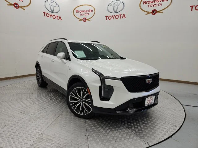 Used 2024 White Cadillac Sport image 1