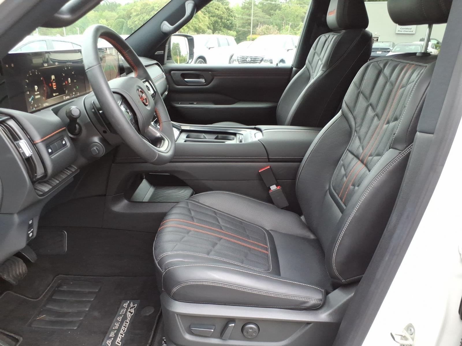 Used 2025 Aspen White Tricoat/Super Black Nissan PRO-4X image 11