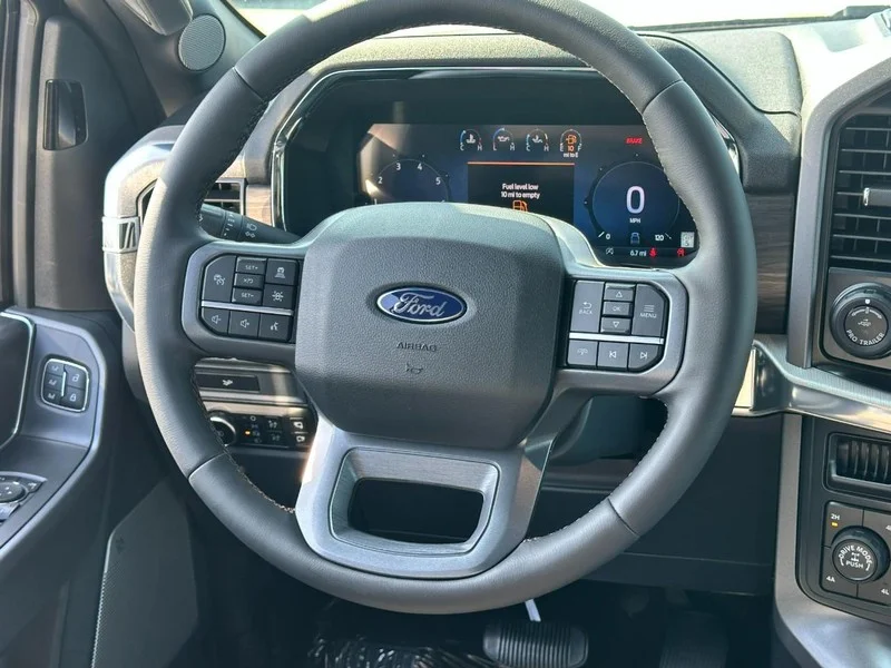 New 2026 Agate Black Metallic Ford LARIAT 4WD SuperCrew 5.5