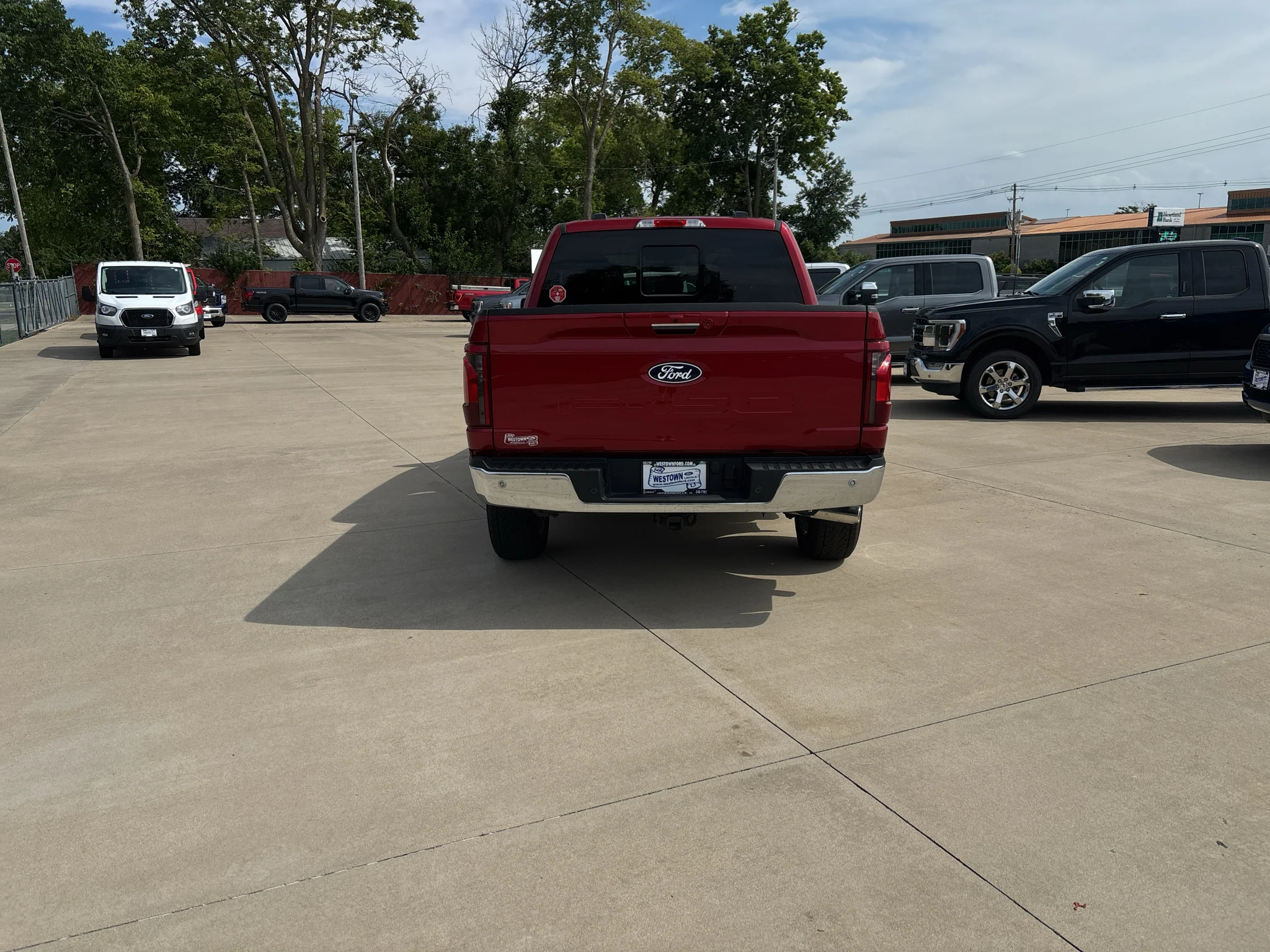 Used 2024 Rapid Red Metallic Tinted Clearcoat Ford XLT image 4