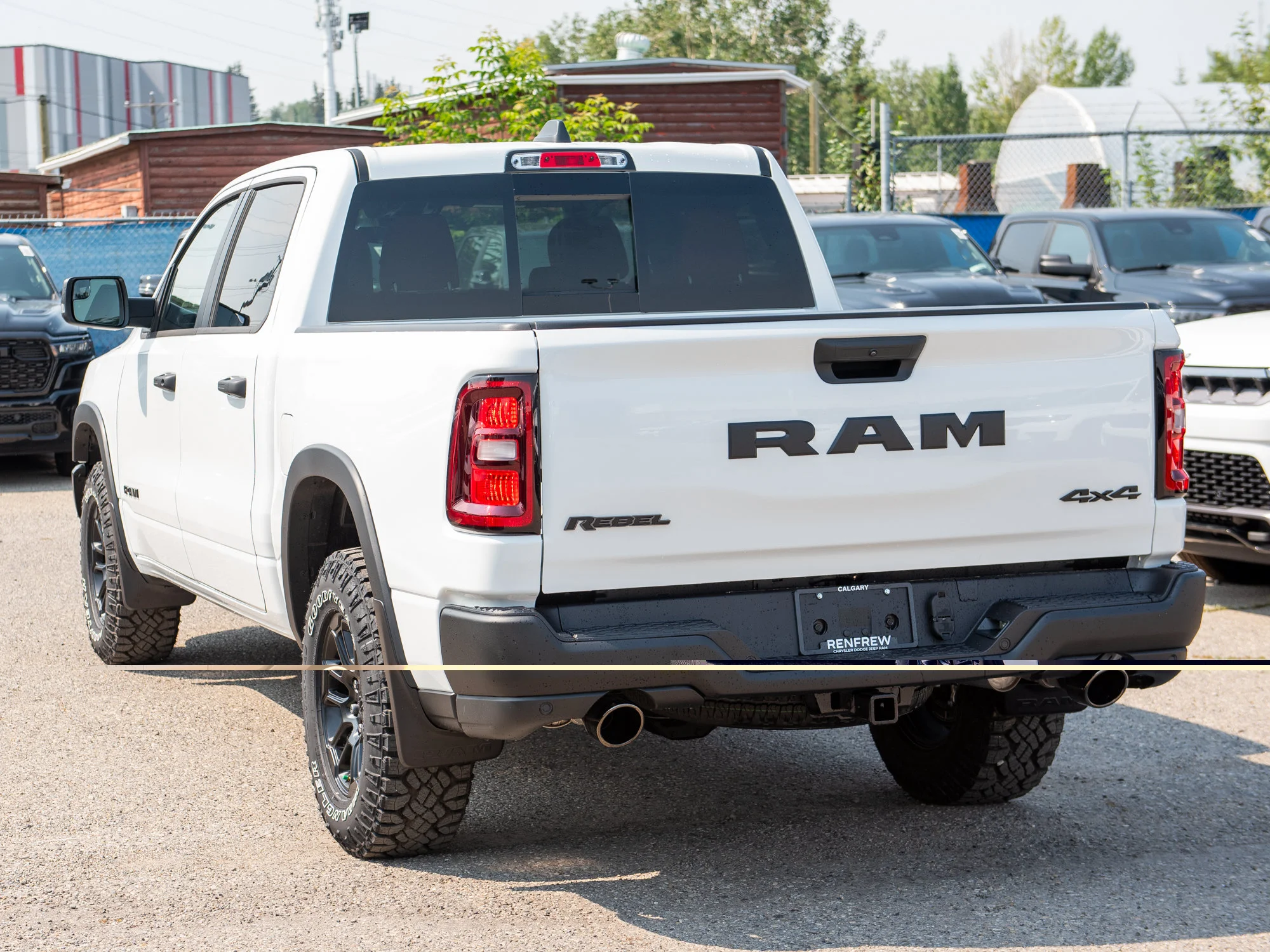 New 2026 White RAM Rebel* Crew Cab 4x4, 33 Inch A/T Tires, Factory Suspension Lift, Bilstein Shocks image 5
