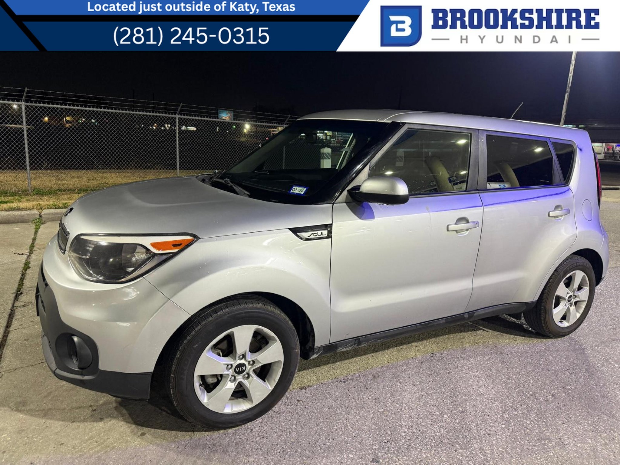 Used 2018 Bright Silver Kia Base image 1