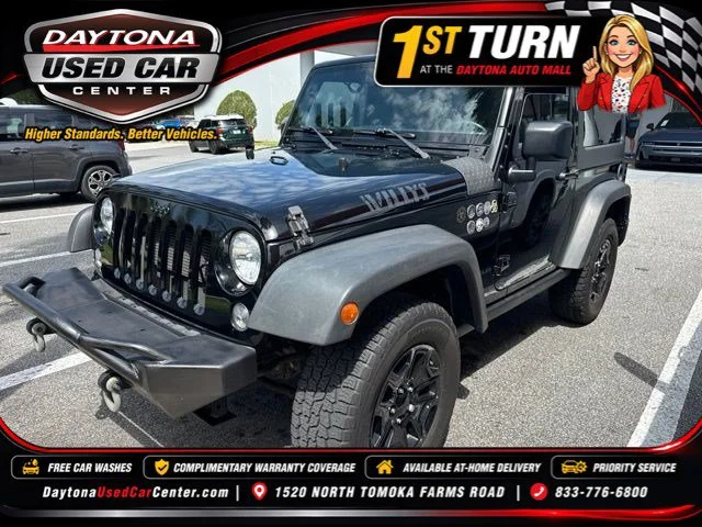 Used 2017 Black Clearcoat Jeep Willys Wheeler image 1